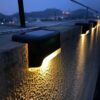 Solar outdoor lamp with day and night solar sensor - IP65 Waterproof - 4 pcs - Garden lighting - Warm white - Solar energy - For stairs, fences, terrace