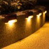 Solar outdoor lamp with day and night solar sensor - IP65 Waterproof - 4 pcs - Garden lighting - Warm white - Solar energy - For stairs, fences, terrace - Image 2