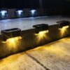 Solar outdoor lamp with day and night solar sensor - IP65 Waterproof - 4 pcs - Garden lighting - Warm white - Solar energy - For stairs, fences, terrace - Image 5